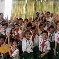 Ajay and Meng with year 2 students at Tianhe Hui Jing Elementary School, Guangzhou, China